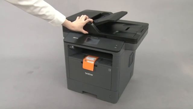 Unboxing the Brother MFCL5705DW смотреть онлайн