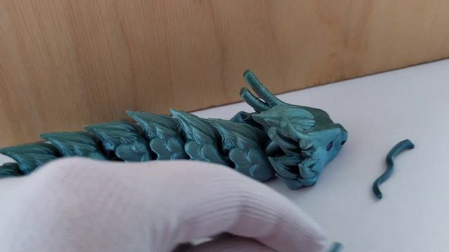 голубой дракон символ нового года 2024 года. игрушки антистресс. подвижные игрушки дракон антистрес смотреть онлайн