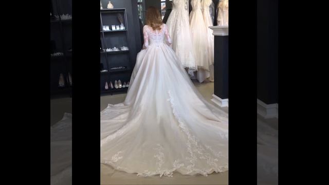 Свадебное платье Сэйнит с длинным шлейфом и рукавами смотреть онлайн