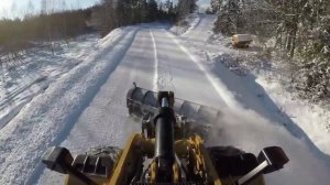Уборка снега при помощи фронтального погрузчика Cat 972m