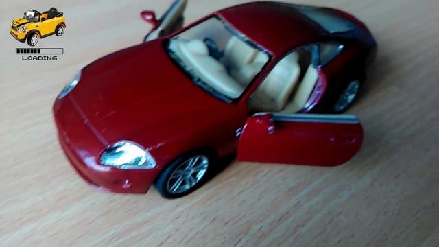 Игрушечная машинка Ягуар. Toy car Jaguar | Loading review смотреть онлайн