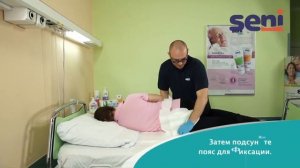 Seni Optima - активация и надевание подгузника для взрослых с поясом