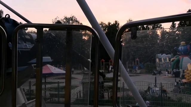 Город и закат с высоты колеса обозрения смотреть онлайн
