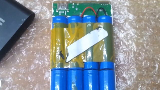 Песок в powerbank Xaomi 20800mah. Китайцы жгут напалмом смотреть онлайн