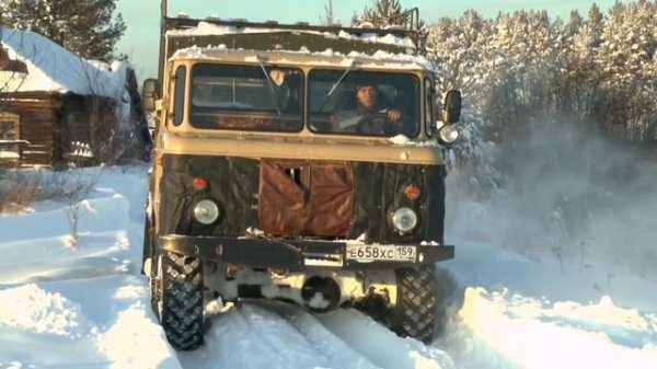 Газ 66 по глубокому снегу.