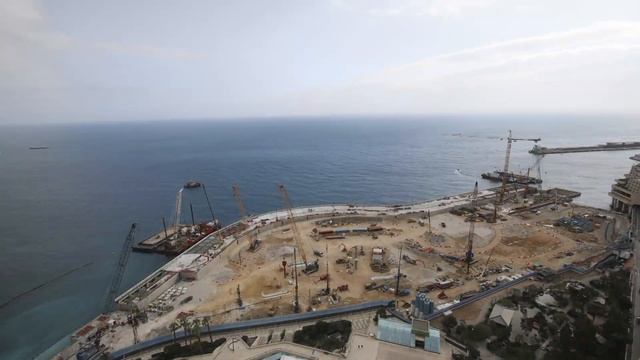 A ballet of trucks, cranes, lifting devices all over the site. Watch February time lapse ! смотреть онлайн