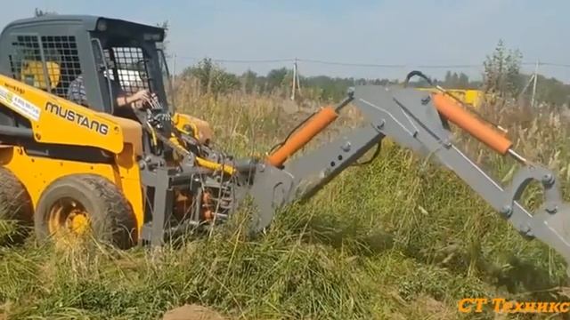 Навесной экскаватор для мини-погрузчиков Бобкет смотреть онлайн