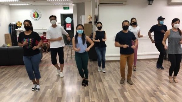 Caliente Dance Studio Singapore Modern Bachata shines demo to Daniel Santacruz - Bailando Contigo