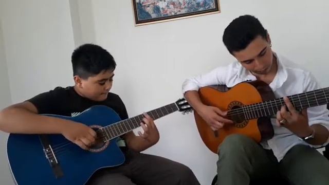 Romance Guitar ( Öğrencim Güney ile Romance eserini çaldık) смотреть онлайн