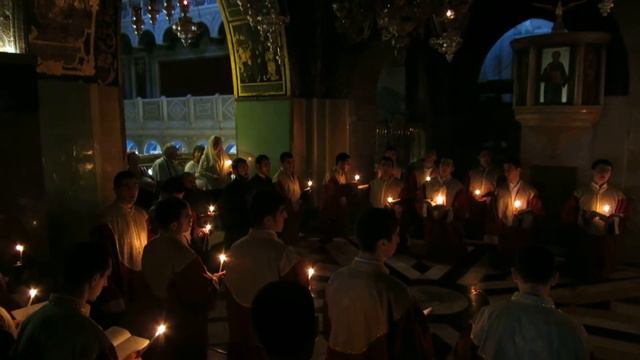 Armenian Orthodox clergy members in a moving prayer at Golgotha, Church of the Holy Sepulchre смотреть онлайн
