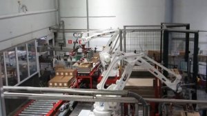 Роботизированный комплекс для порядной паллетизации коробов.