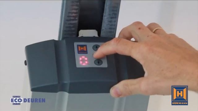 Inleren Van Een Handzender Bij De Hörmann Supramatic Aandrijving
