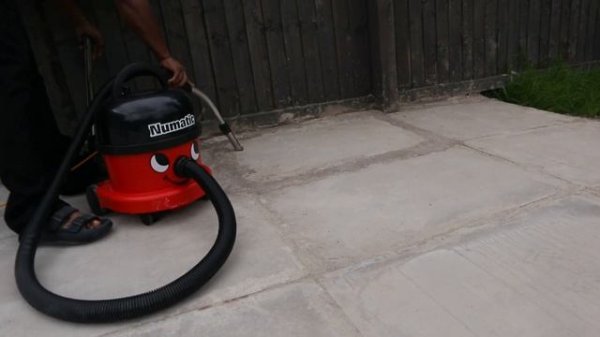 Vacuuming the Patio With Numatic Henry International Vacuum Cleaner