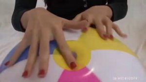 Beach ball sit to pop