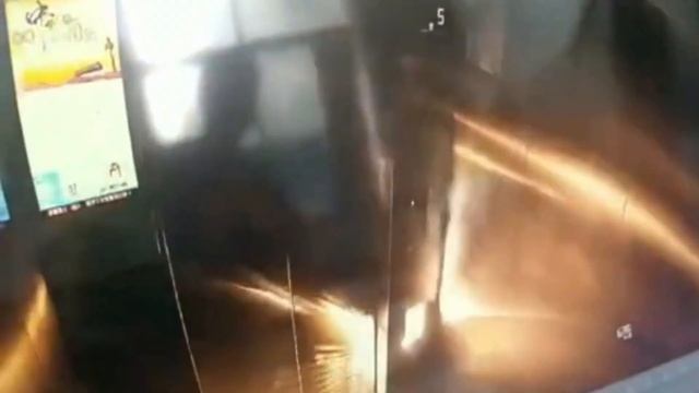 Moment Lift Catches Fire After Young Chinese Boy Pees On Buttons