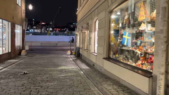 Stockholm Walks: Österlånggatan - Slussen. From Christmas Lights To Stockholm Landmark Sign