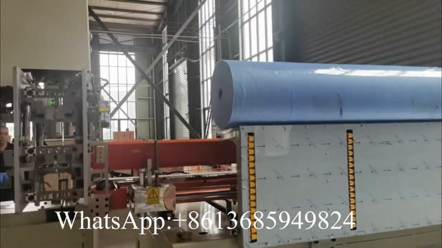 Автоматическая ленточная пила для резки рулонов нетканого материала