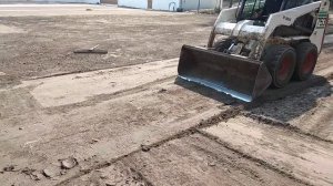 Планировка частка Бобкетом bobcat под посев газона