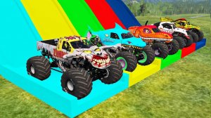 Большие грузовики-монстры перевозят двойную платформу с цветным слайдом 2