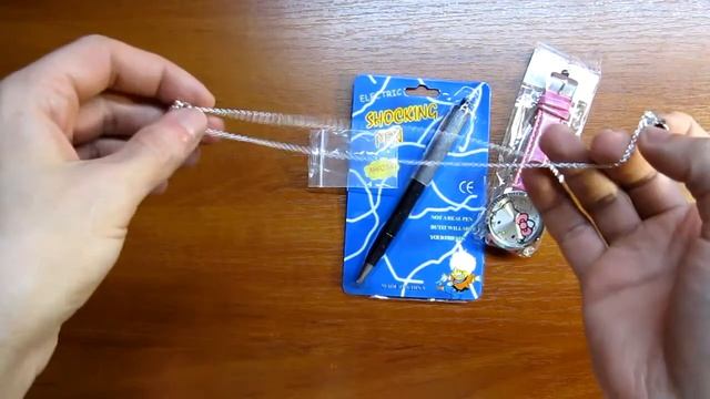 Кулон, Часы "Hello Kitty", Ручка Электрошокер. смотреть онлайн