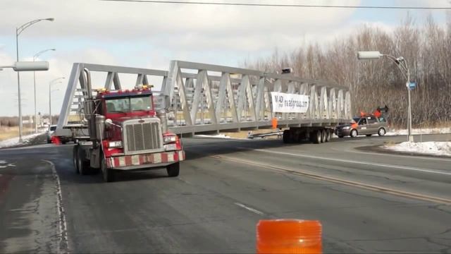 MAADI Group - LONGEST CANADIAN ALUMINUM PONY-TRUSS PEDESTRIAN BRIDGE