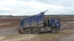 Scania P440 6x6 KH-Kipper working in the mud part 1