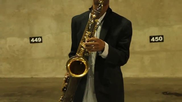 Cameron Ross Playing Saxophone during a photo shoot смотреть онлайн