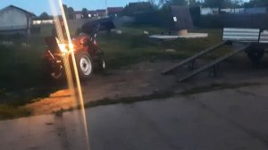 Погрузка минитрактора Русич-т18 на прицеп!