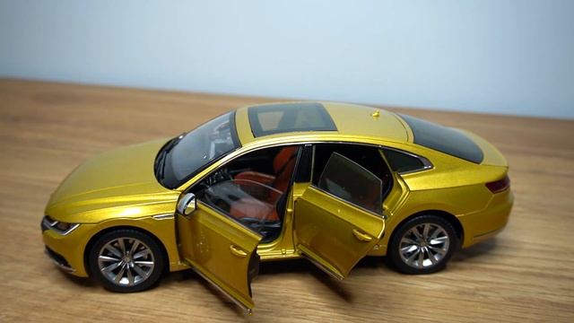 Unpacking the 1:18 scale Volkswagen ARTEON in color yellow "Turmeric" metallic - Made in Hina смотреть онлайн