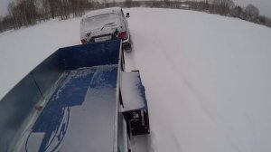 поле, снег и нива с прицепом, пробуем перевезти груз