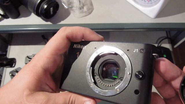 Nikon 1 J1 Kit первое впечатление и сравнение габаритов смотреть онлайн