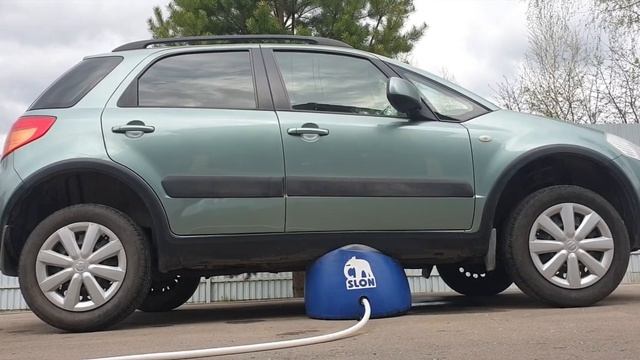 Сузуки SX4 от выхлопной трубы за 25 секунд. Надувной домкрат Слон. смотреть онлайн