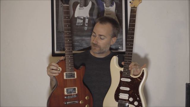 Fender Stratocaster vs Gibson Les Paul Comparison - What Is The Difference? смотреть онлайн