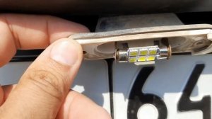 Замена подсветки номерного знака на Шевроле-Нива.