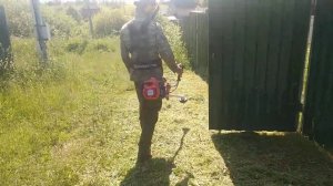 Husqvarna 545 fx на покосе травы.первый запуск