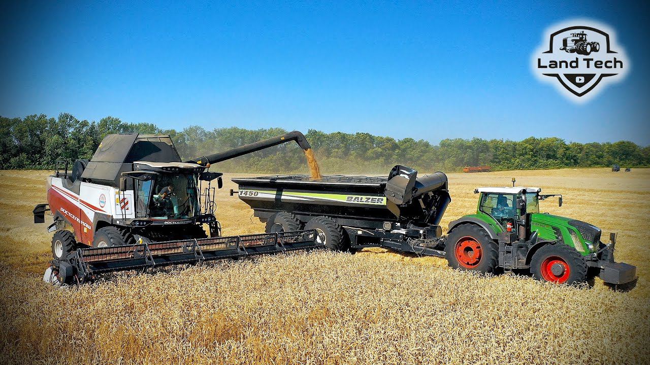 Мощные российские комбайны РСМ-161 разгружаются на ходу в огромный перегрузчик зерна BALZER 1450! смотреть онлайн