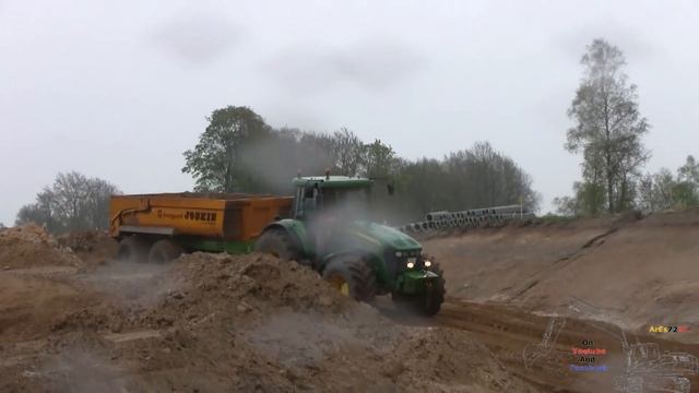 Volvo EC210B Excavator Loading John Deere And New Holland Tractors