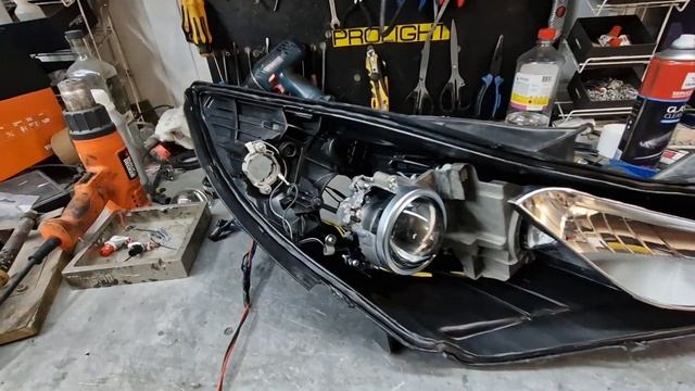 Hyundai Sonata Замена штатных выгоревших линз на бидиодные линзы Aozoom A13 BI-LED смотреть онлайн
