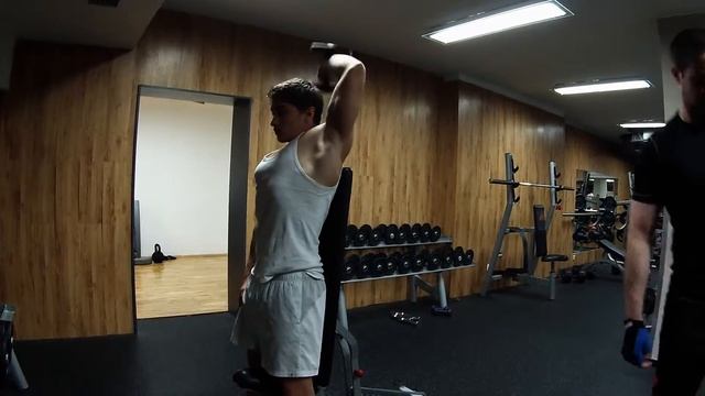 Arms Exercise - Standing One-Arm Dumbbell Triceps Extension