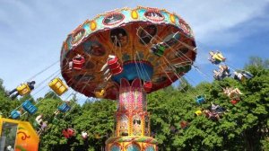 Аттракционы в парке Швейцария. Ромашка.