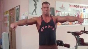 Махи гантелями в стороны стоя