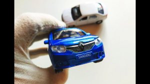 Про МАШИНКИ. Модельки Рено Логан и Сандеро / Renault  Logan и Sandero распаковка и обзор.