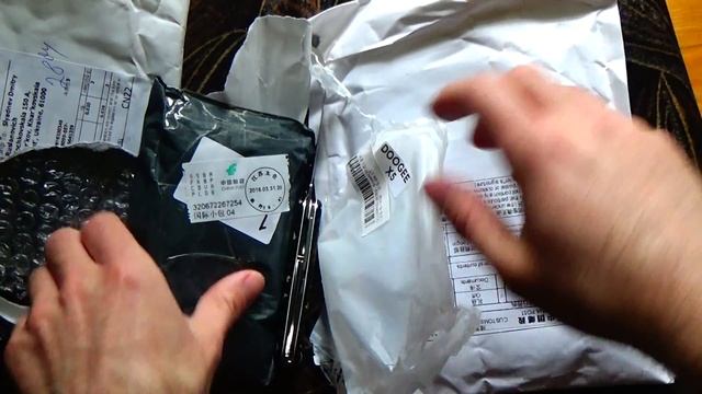 Распаковка аксессуаров на Doogee X5/Aliexpress смотреть онлайн