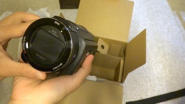 Unboxing a Sony Handycam FDR-AXP55 camcorder from China смотреть онлайн