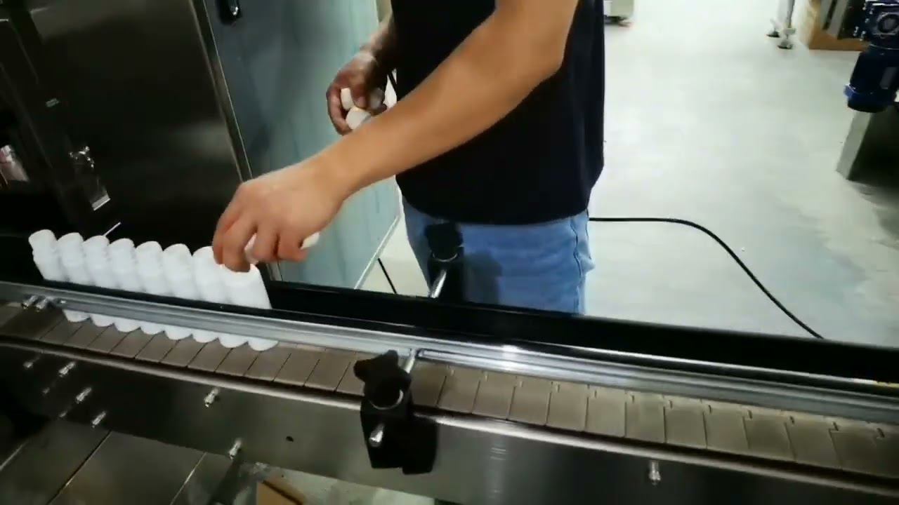 AU-R-140H Автоматическая высокоскоростная укупорочная машина 100 мл смотреть онлайн