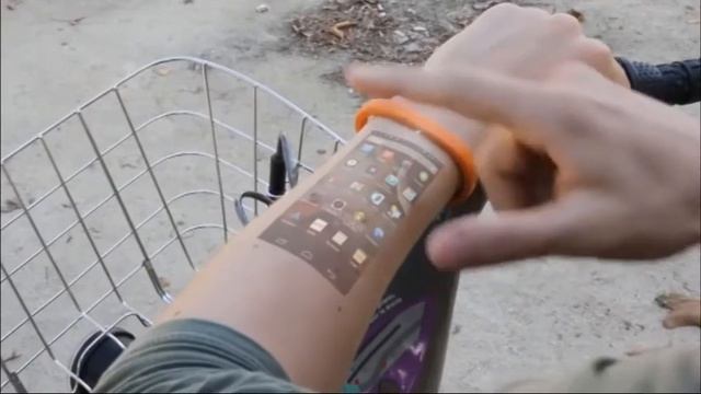 Браслет, превращающий руку в сенсорный дисплей смотреть онлайн