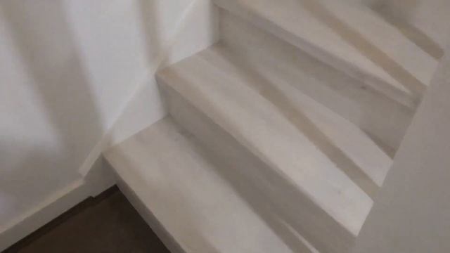 Open String Staircase Covered With Quick-Step Creo Laminate Flooring