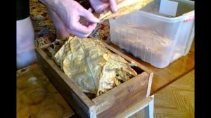 Закладка высушенного табачного листа на хранение (вылежку).