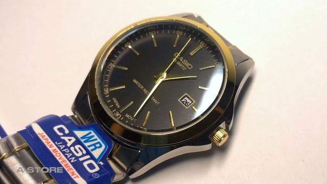 Часы Casio Quartz черно-серебряно-золотые