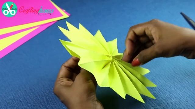 DIY Paper Rosettes Garland For Simple Party Decorations On Budget